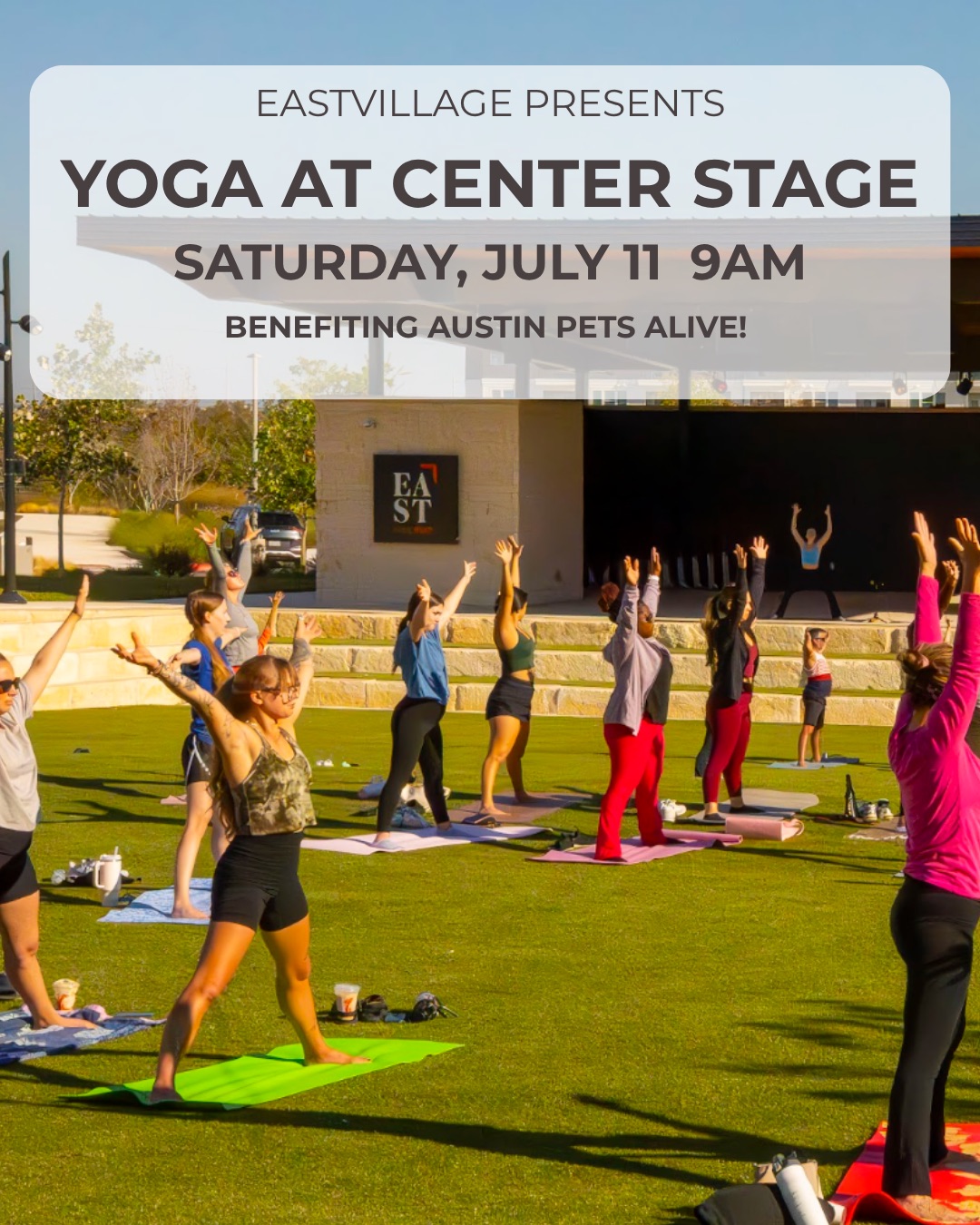 EastVillage presents Yoga at Center Stage, Saturday July 11 at 9am, benefiting Austin Pets Alive! — a group flowing on the lawn at Center Stage in Austin.